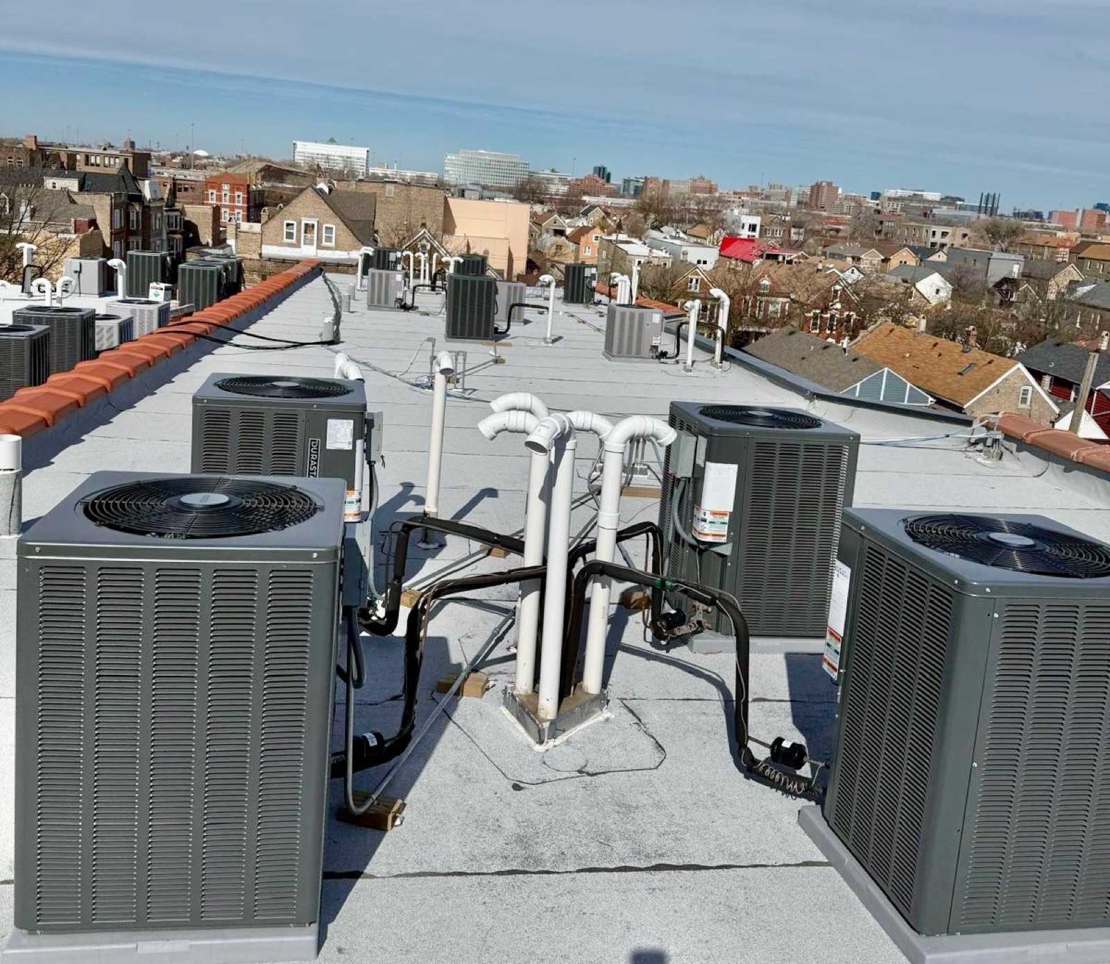 Rooftop condensers over the Chicago skyline
